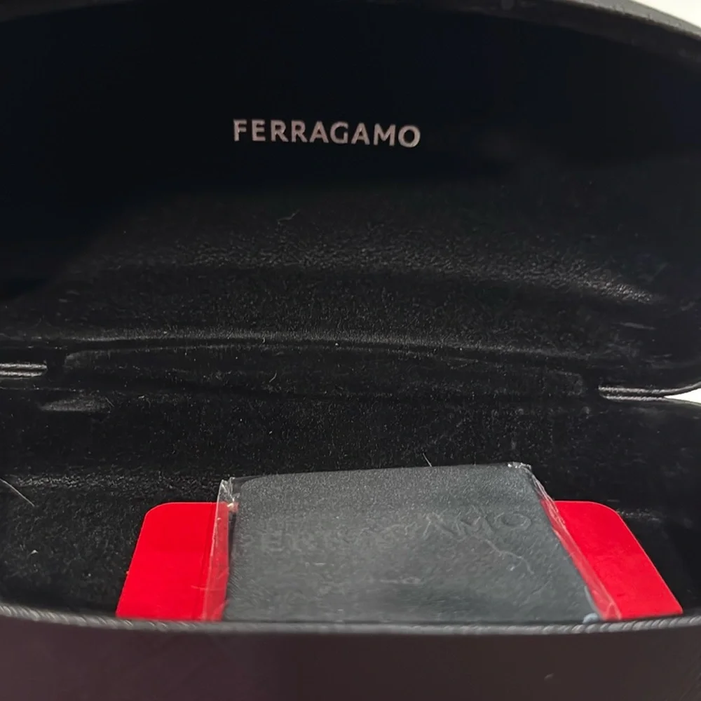 Salvatore Ferragamo Tortoise Sunglasses with SF Logo at Temples.